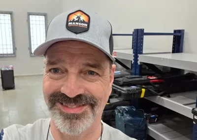 Marty Gunderson Rifle in a Manson Reamers Hat